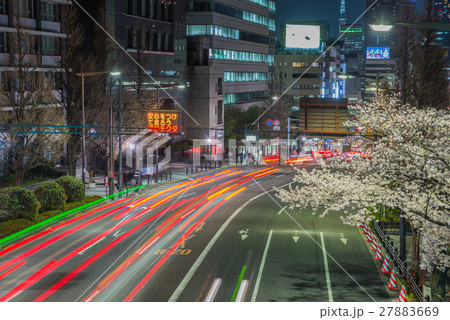 Cherry blossoms street at night 27883669