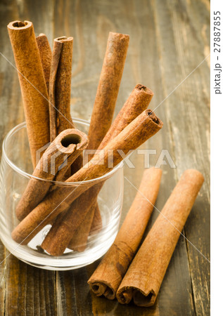 Cinnamon sticks on wooden background Cinnamon sticks on wooden background 27887855