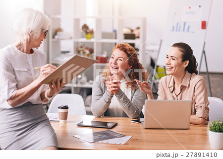 Positive businesswomen working in the business 27891410