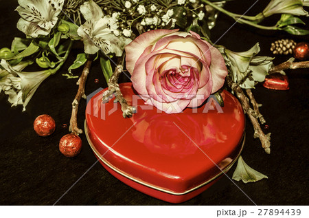 Rose and dry twigs and red box heart 27894439