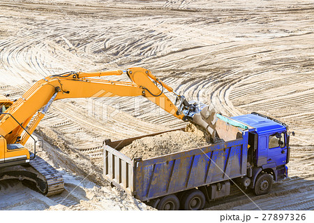 Excavator working on sand quarry Excavator working on sand quarry 27897326