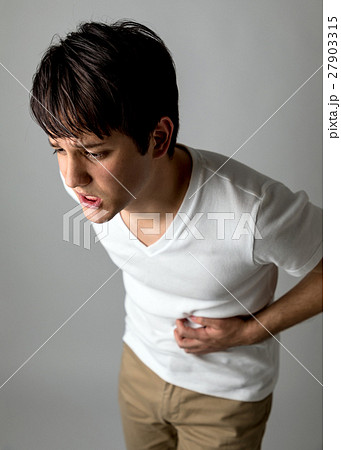 腹痛の男性の写真素材