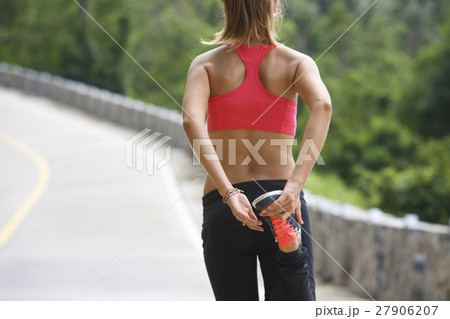 fitness woman running at tropical forest trail fitness woman running at tropical forest trail 27906207