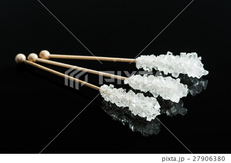 Crystallized sugar on wooden stick. 27906380