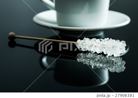Crystallized sugar on wooden stick. 27906381