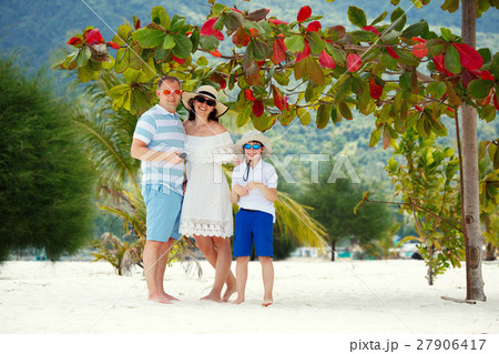 Happy beautiful family on Malibu beach at Koh 27906417