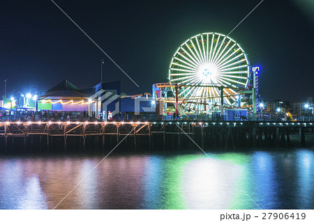 Venice beach at night with reflection in water. 27906419