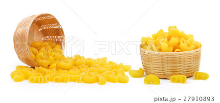 dry macaroni in the basket on white background 27910893