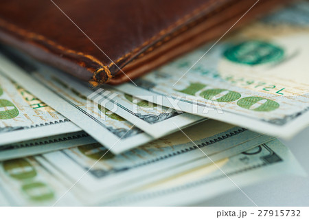 Brown leather wallet with USA dollars money Brown leather wallet with USA dollars money 27915732