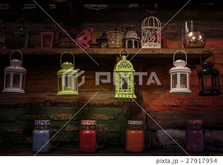 Lanterns hanging on the shelf 27917954