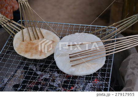 hin slices of rice flour crisped over an open fire 27917955