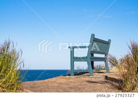 A bench on shore of the Baltic Sea 27925327
