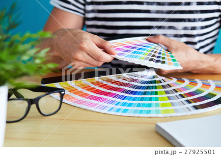 Graphic designer choosing a color 27925501