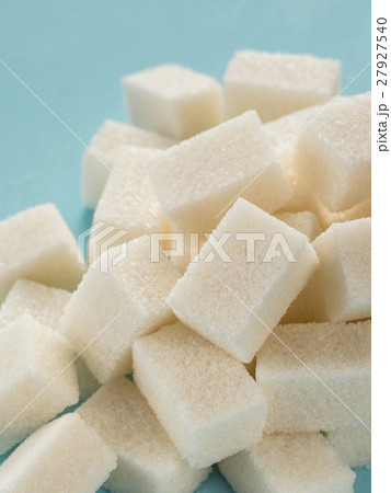 background of white sugar cubes 27927540