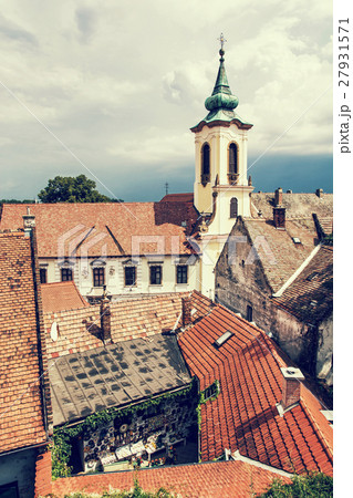 Annunciation church and red roofs of old houses Annunciation church and red roofs of old houses 27931571