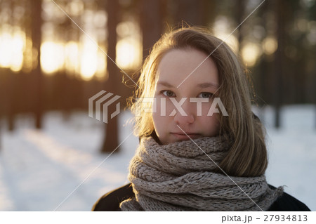 teenage girl portrait in winter pine forest is teenage girl portrait in winter pine forest is 27934813