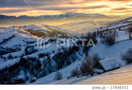 winter landscape in mountainous rural area 27936331