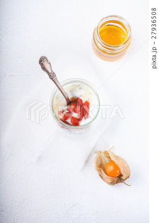 Yoghurt with goji berries, chia seeds and honey Yoghurt with goji berries, chia seeds and honey 27936508