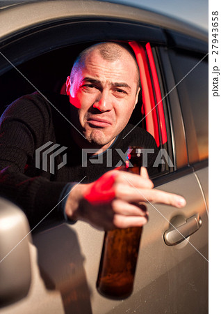 Male drunk driver showing fuck gesture Male drunk driver showing fuck gesture 27943658