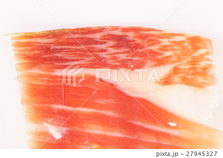 Serrano ham slice closeup, top view 27945327
