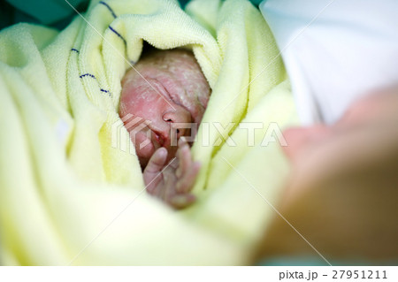 Mother looking for first time her baby being born Mother looking for first time her baby being born 27951211