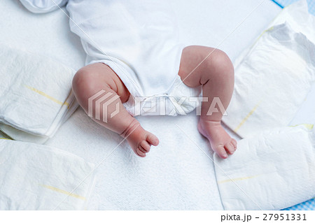 Feet of newborn baby boy or girl on changing table 27951331