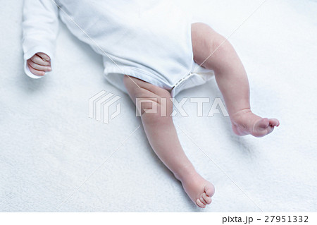 Feet of newborn baby boy or girl on changing table 27951332