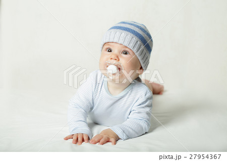 Cute child - baby with pacifier on background 27954367