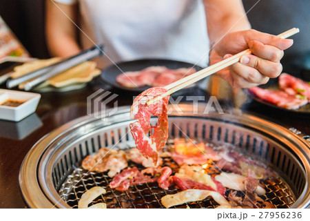 Raw beef slice barbecue Japanese style yakiniku Raw beef slice barbecue Japanese style yakiniku 27956236