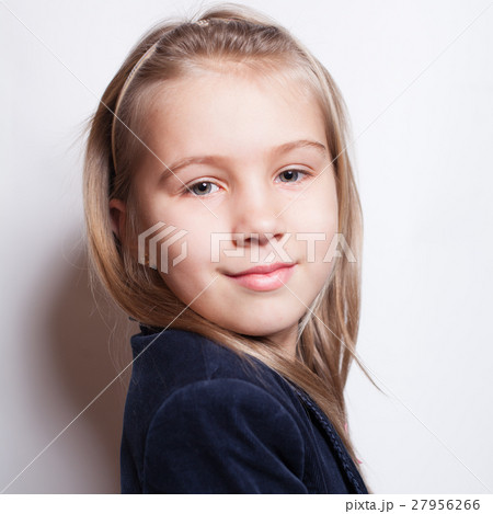 Smiling little girl pupil 27956266