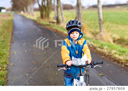 Little preschool kid boy riding on bicycle Little preschool kid boy riding on bicycle 27957609