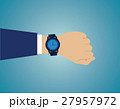 Wristwatch on the hand of businessman in suit 27957972