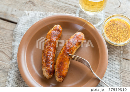 Grilled sausages with glass of beer Grilled sausages with glass of beer 27959310