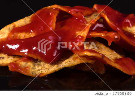 Nachos - tortilla chips with tomato spicy sauce Nachos - tortilla chips with tomato spicy sauce 27959330