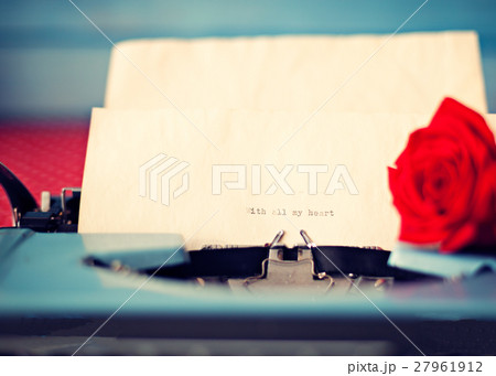 Vintage typewriter with love message and rose Vintage typewriter with love message and rose 27961912