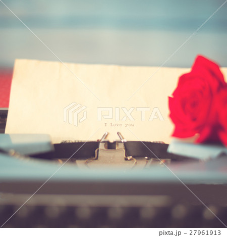 Vintage typewriter with love message and rose Vintage typewriter with love message and rose 27961913