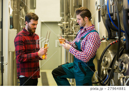 Brewers testing beer 27964881