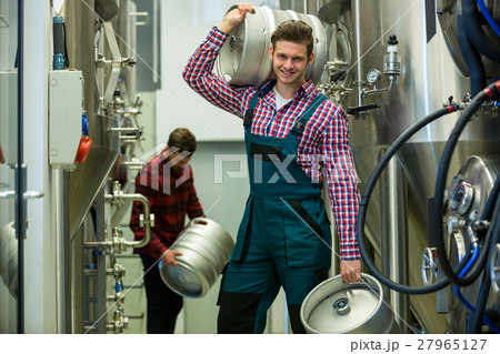Brewer carrying keg Brewer carrying keg 27965127