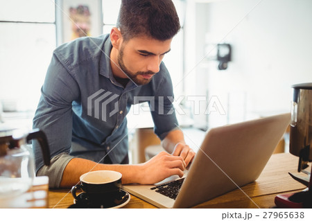 Graphic designer working on laptop Graphic designer working on laptop 27965638