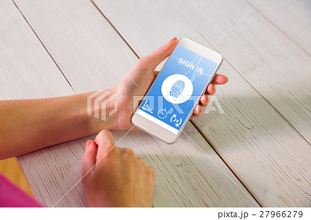 Composite image of woman using smartphone Composite image of woman using smartphone 27966279