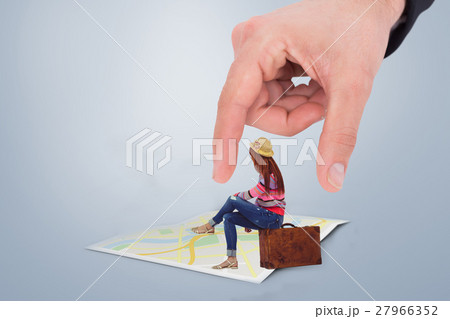 Composite image of hipster woman sitting on her suitcase Composite image of hipster woman sitting on her suitcase 27966352