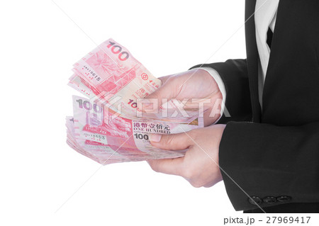 woman in suit with Hong Kong Dollar money 27969417