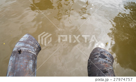 Water discharge pipe canal in the city Water discharge pipe canal in the city 27974757