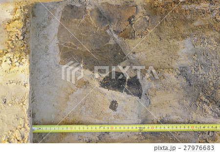 Ancient broken vessel in a hole 27976683