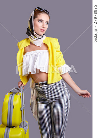 Pretty young woman in grey yellow vintage cloth isolated Pretty young woman in grey yellow vintage cloth isolated 27978935