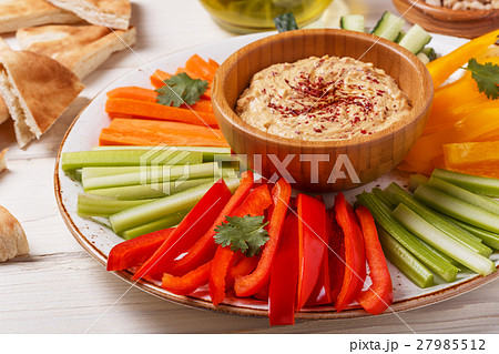 Homemade hummus with assorted fresh vegetables. Homemade hummus with assorted fresh vegetables. 27985512