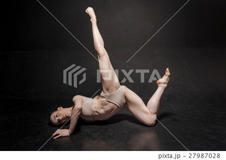 Concentrated young dancer acting in the white 27987028
