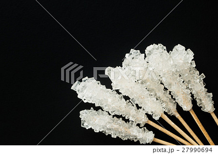 Crystallized sugar on wooden stick. 27990694