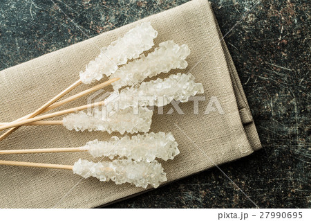 Crystallized sugar on wooden stick. 27990695