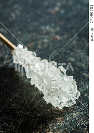 Crystallized sugar on wooden stick. 27990703